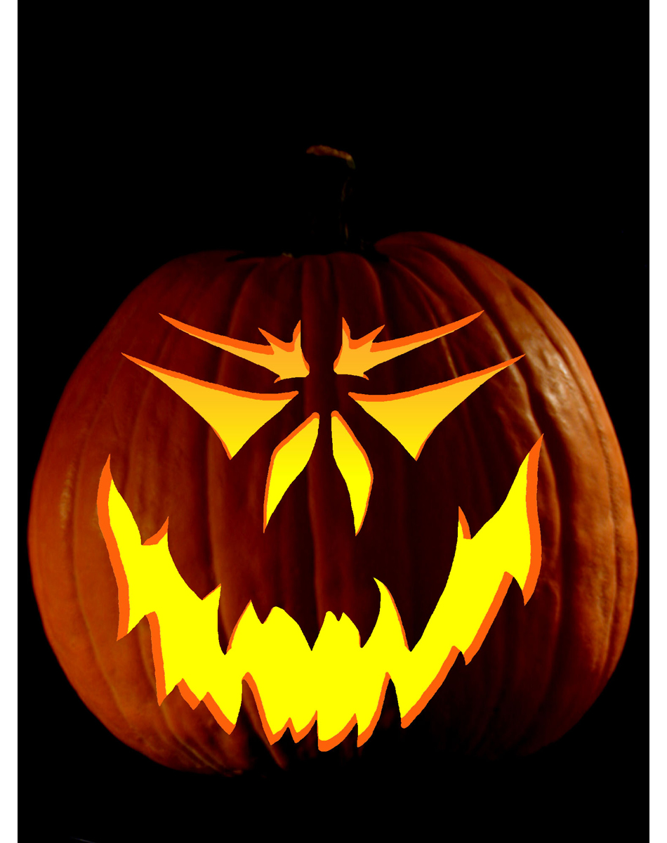 Amazing Halloween carved pumpkin by Beverly Tilley glows showing a ...