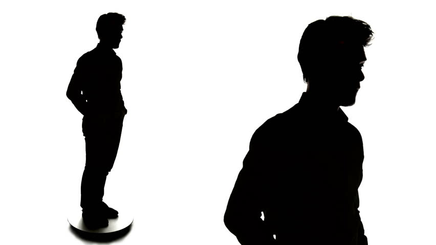 Silhouette Of Two Man. A Male Reporter Interviews A Man On Black ...