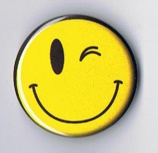 Winking smiley face 1.25 inch pinback button by emmamariadesigns