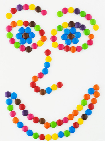 Coloured Chocolate Beans Forming a Smiling Face Photographic Print ...