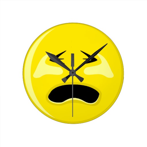 Yellow Sad Smiley Face Wall Clock from Zazzle.