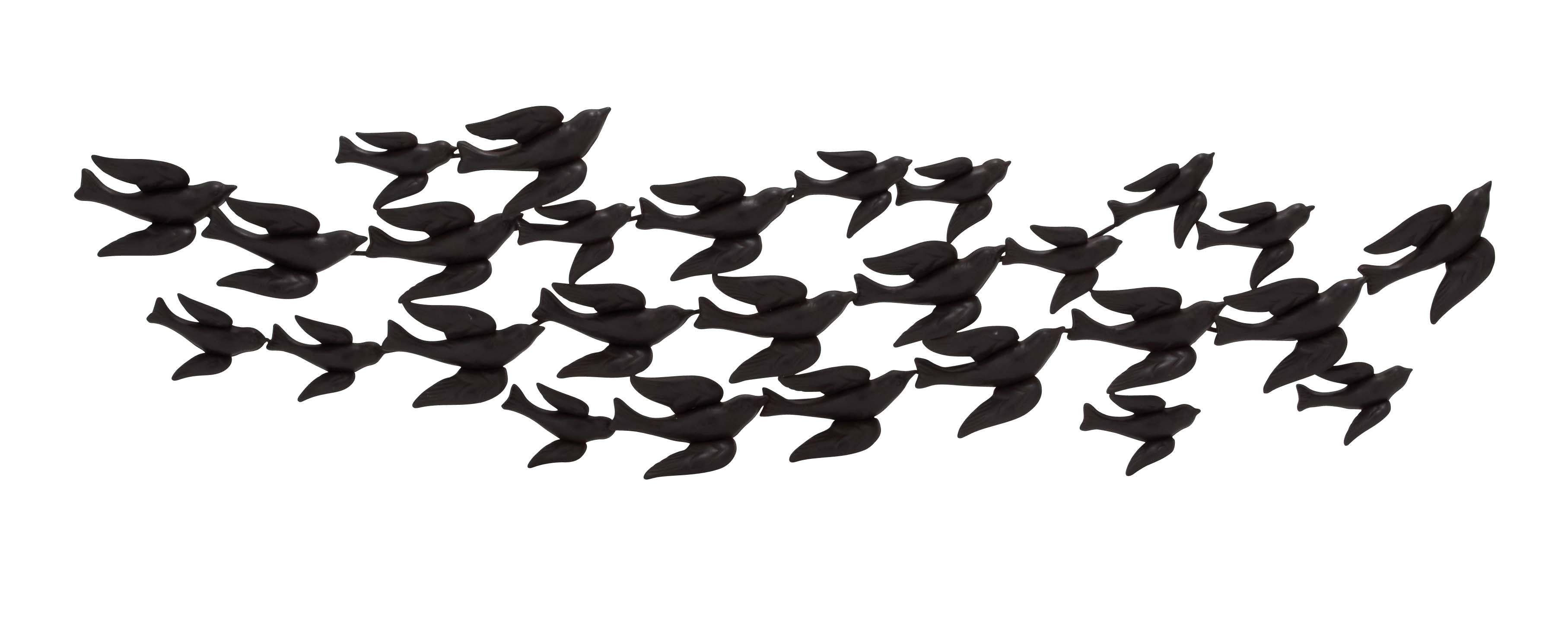 Flock of flying birds carved in metal