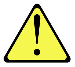 Yellow warning triangle sign stock photo