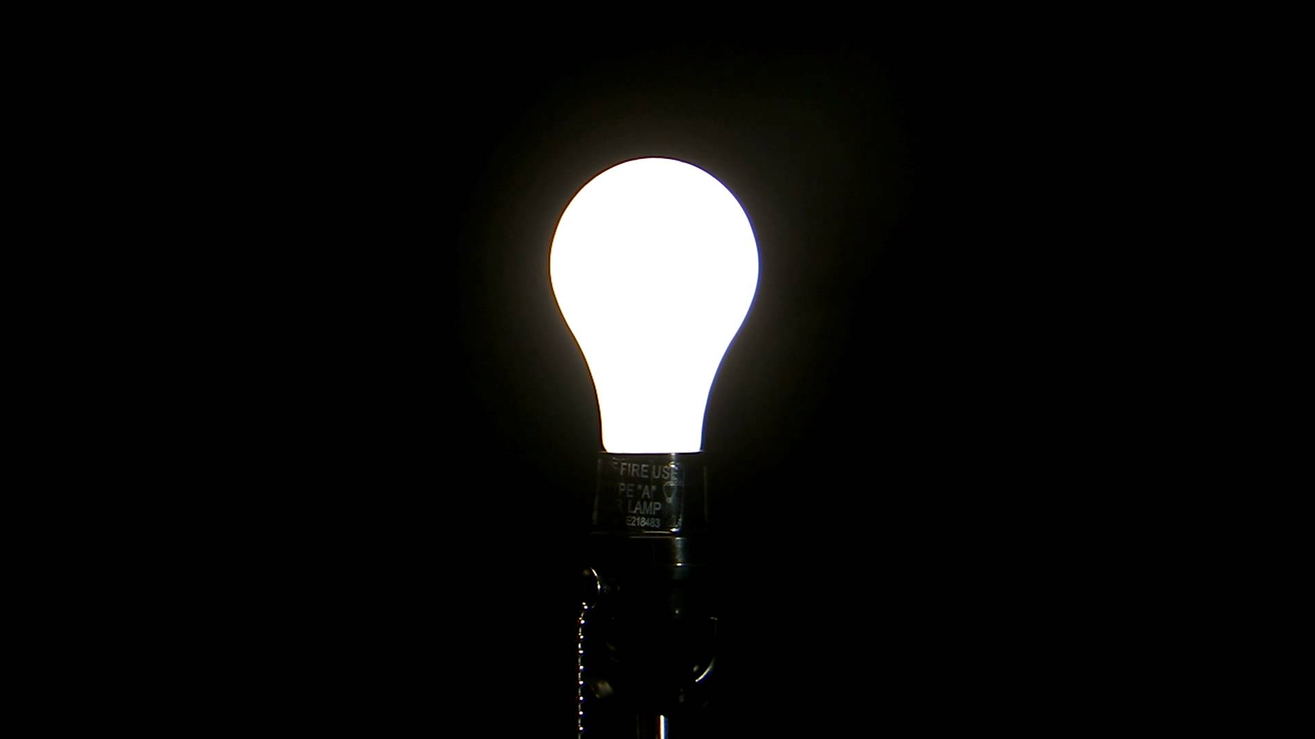 light bulb on black background