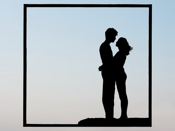 Silhouette Of Two People Kissing